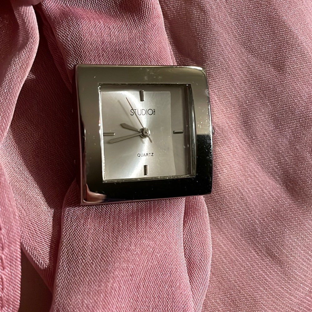 Stylish scarf Quartz watch. Silver face, hands and buckle. New. Never worn.